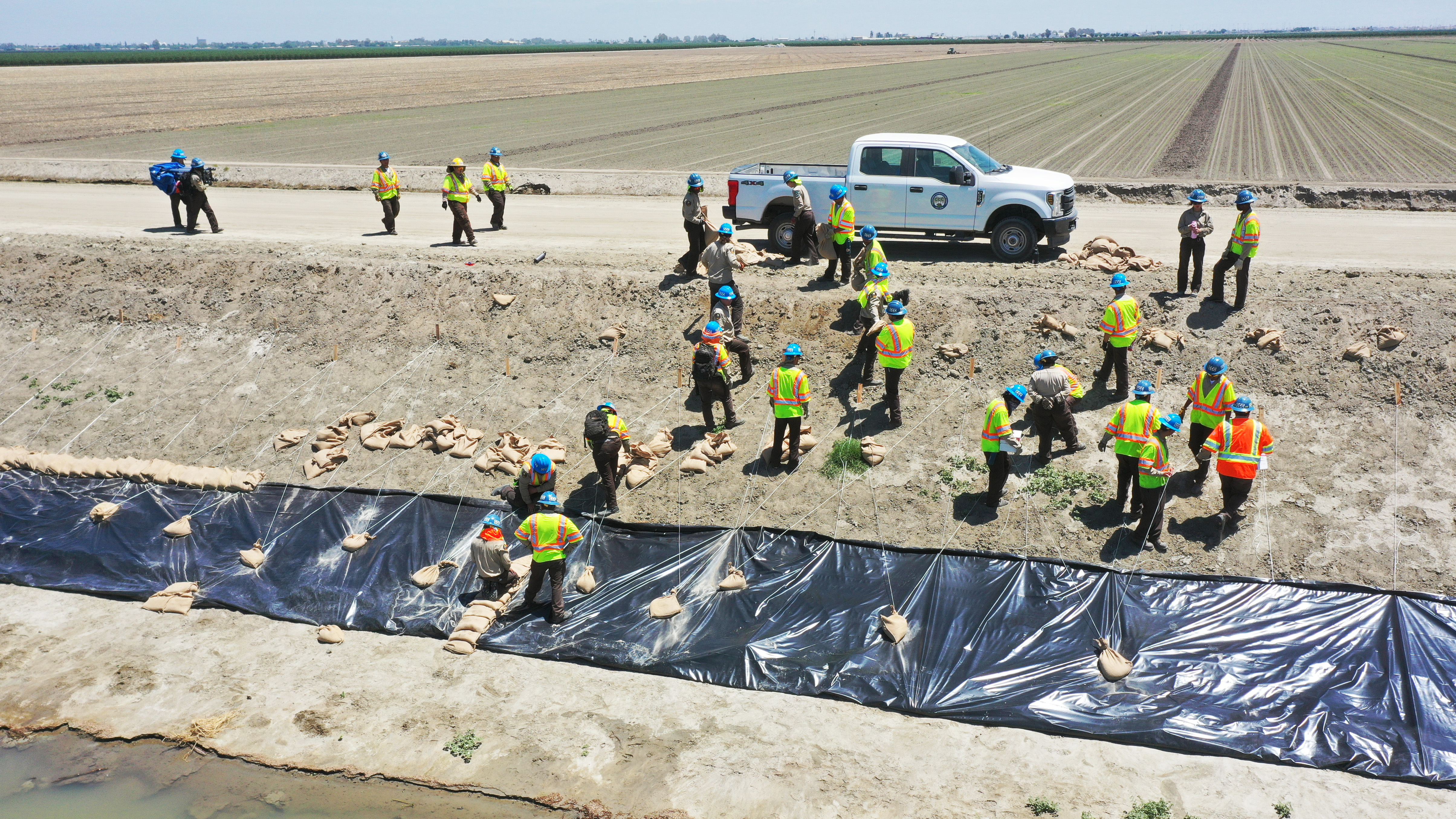 aerial view of corpsmembers working on levee