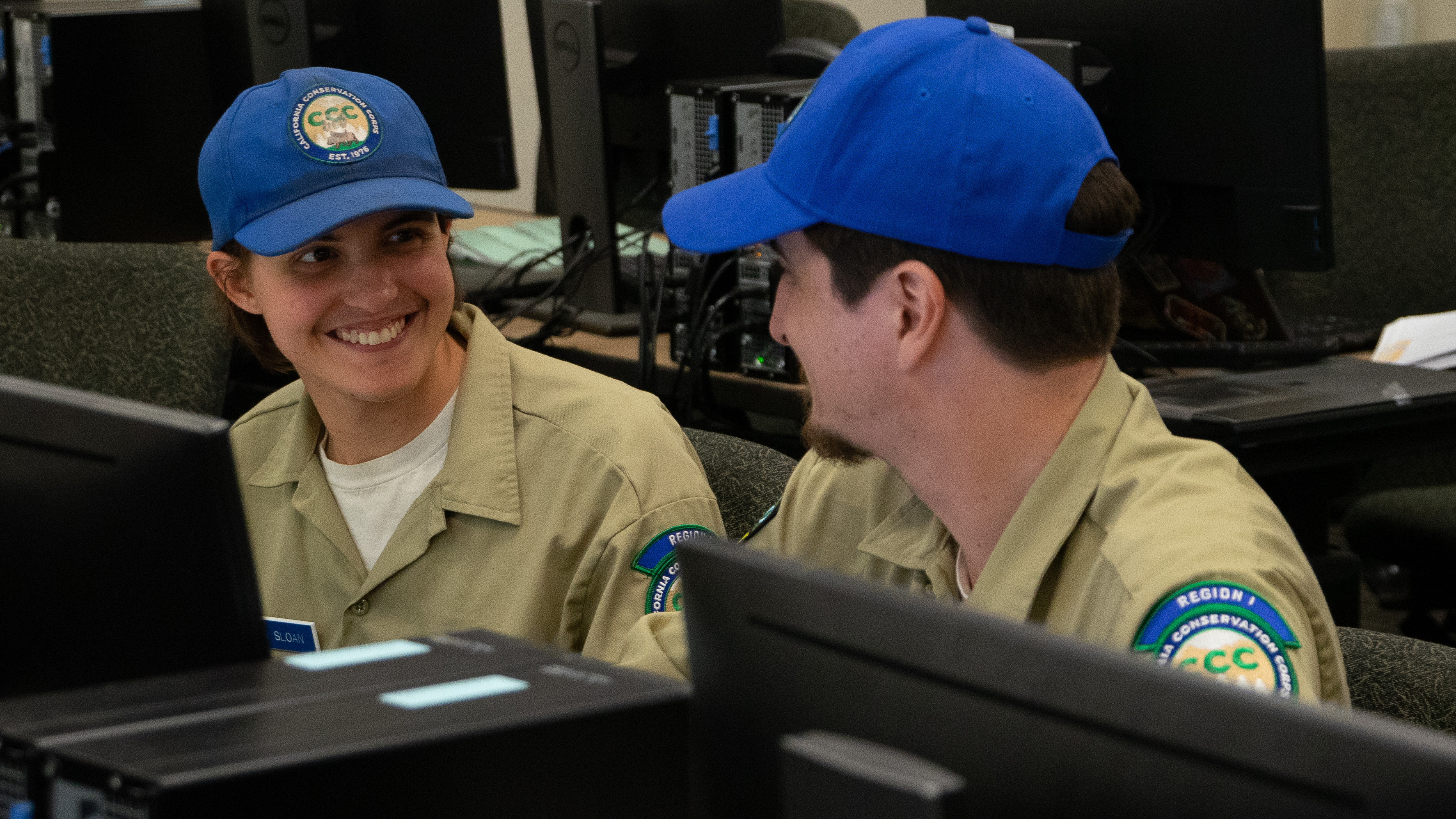 corpsmembers laughing in computer lab